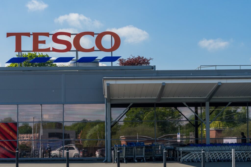 In front of the Tesco supermarket