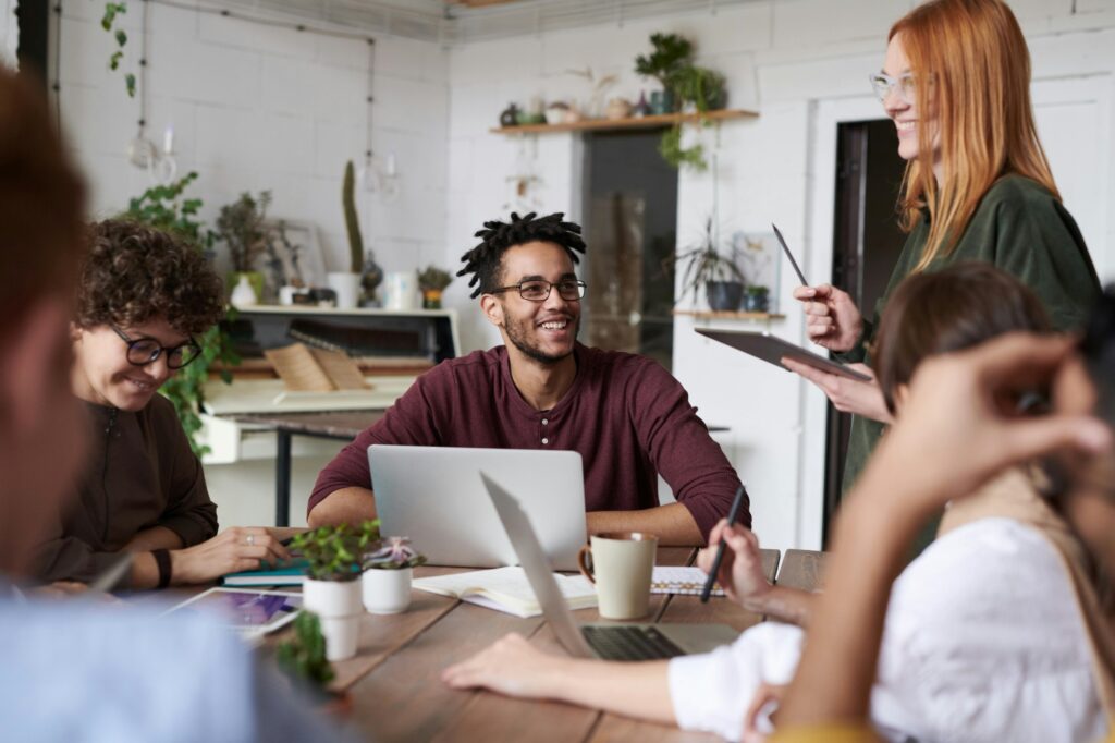A happy team meeting after an office relocation